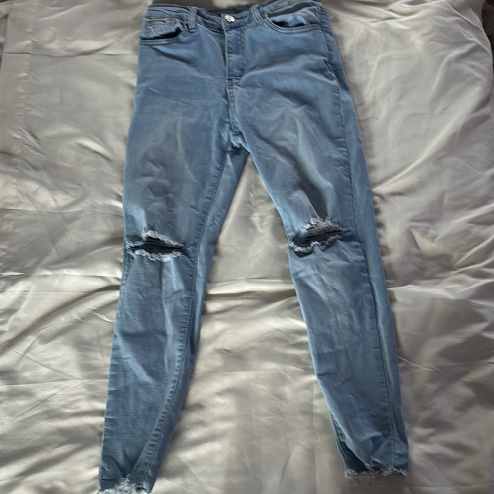 Blue Jeggings with Distressed Knees and Slim Fit